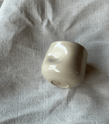 Tommelkop ~ blank beige